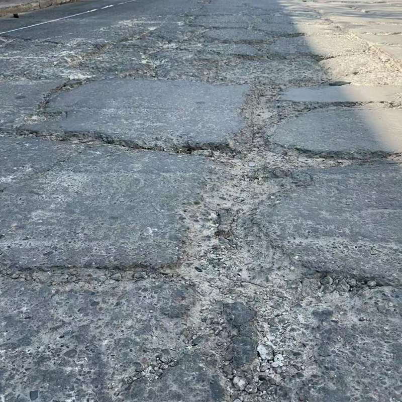 永靖路面起砂露石子修补料
